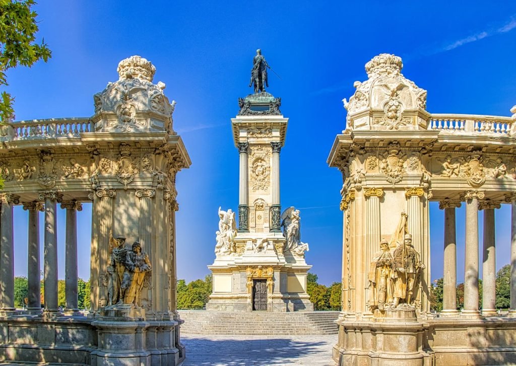 A scenic view of a regal Spanish landscape, showcasing a mix of historic architecture, lush countryside, and charming hidden gems. The image conveys the elegance and cultural richness of Spain.