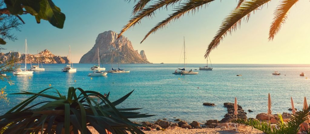 A short ferry ride from Ibiza, Formentera is known for its pristine beaches and crystal-clear waters. Rent a bike to explore the island, visit the stunning Playa de Ses Illetes, and enjoy a more relaxed atmosphere compared to Ibiza’s bustling scene.